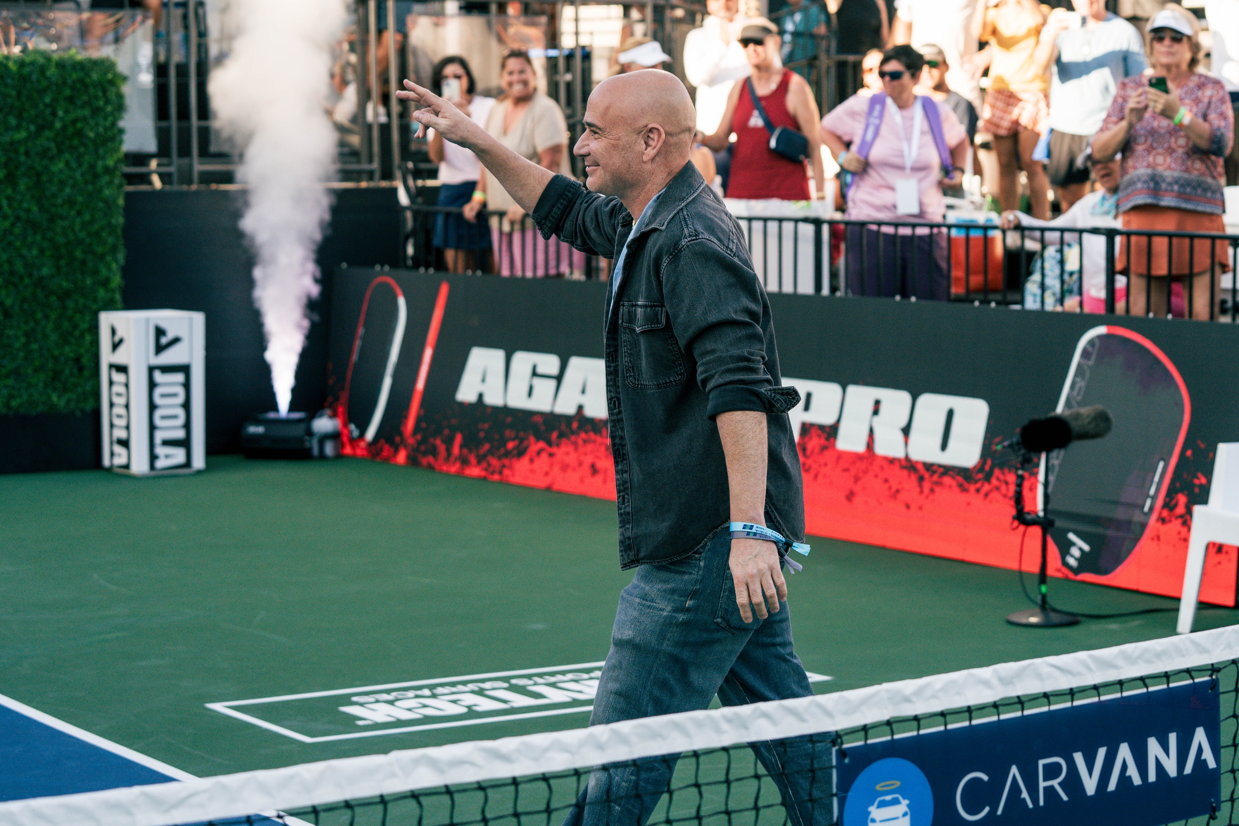 Andre Agassi greeting the fans on Natures Choice Championship Court.